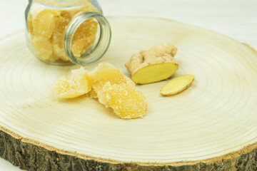 Fresh ginger root and candied ginger in sugar