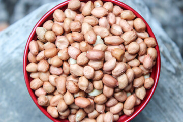 bunch of peeled peanuts or beans in a bowl best for agricultural and food bacground.