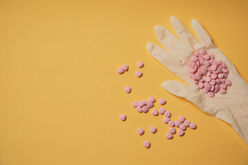 Medicine pill or drug for illnesses, viruses, epidemics. online purchase of medicines. drugs on surgery grove on yellow background, copy space