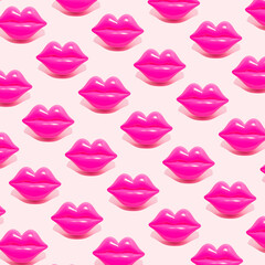 Creative pattern made with magenta lips figurine on pastel pink background. 80s or 90s romantic...