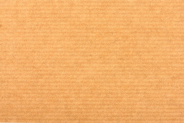 Brown cardboard texture closeup, natural rough textured paper background.