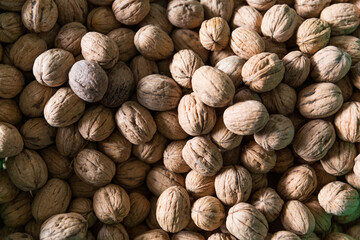 Walnuts standing on the market stall
