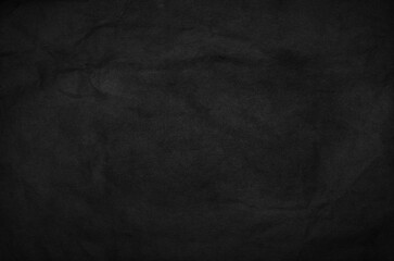 Crumpled black paper for background image