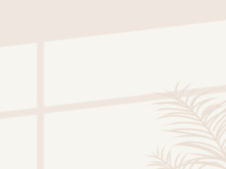 植物と窓の影が壁に映る背景