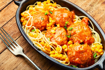 Vegetarian meatballs and pasta.