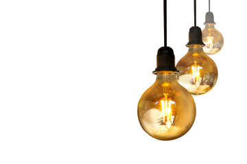 A row of three light bulbs hangs on a wire on a white background.