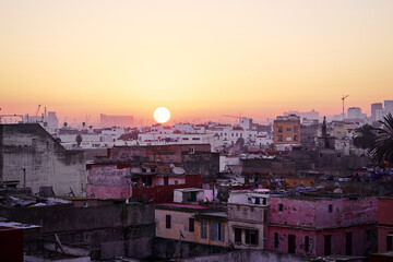 Fototapeta na wymiar The ancient city at sunrise. Old houses in medina of Casablanca, Morocco.