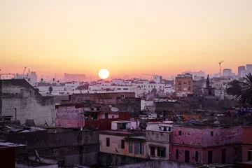 Fotobehang The ancient city at sunrise. Old houses in medina of Casablanca, Morocco. © luengo_ua