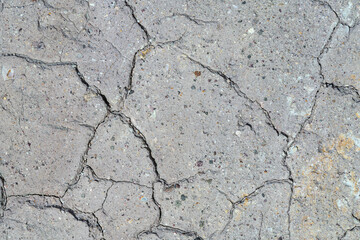 Gray dry cracked stone. Natural background texture. Grunge stone  texture background. Close up texture. Dirty grunge texture. 