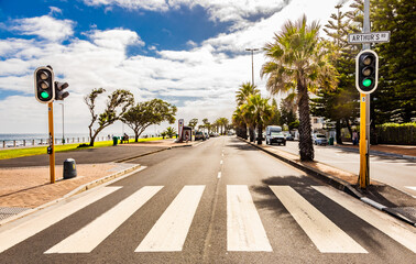 Cape Town, South Africa - May 12, 2022: Zebra Crossing on Sea Point beach front avenue