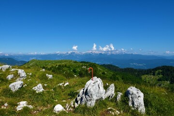 Panoramic view of Julian alps and Ratitovec mountain range in Gorenjska, Slovenia