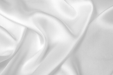 Fototapeta na wymiar Smooth elegant white silk or satin luxury cloth texture can use as wedding background. Luxurious background design.