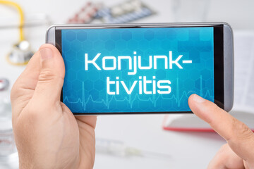 Smartphone mit dem Text Konjunktivitis auf dem Display