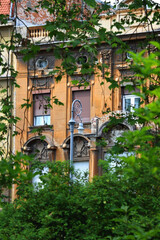 Colorful historical buildings and vintage street lantern in central Zagreb, Croatia.