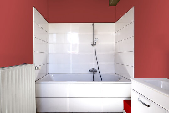 Renovated barthroom with white tiles and new sink