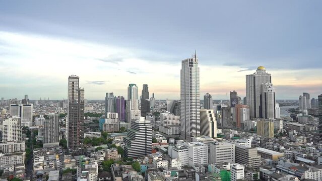 Pan right to left of the skyline of Bangkok.