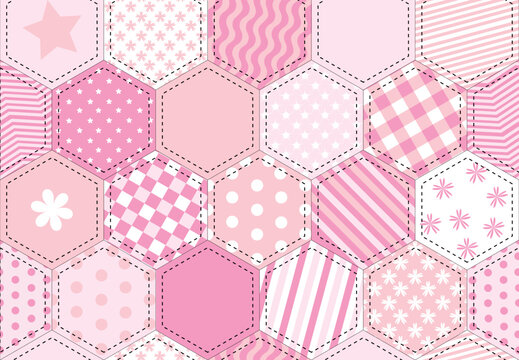 A vector illustration of a patchwork quilt background in shades of pink