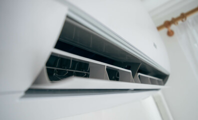 Fototapeta Split air conditioner on a white wall closeup obraz