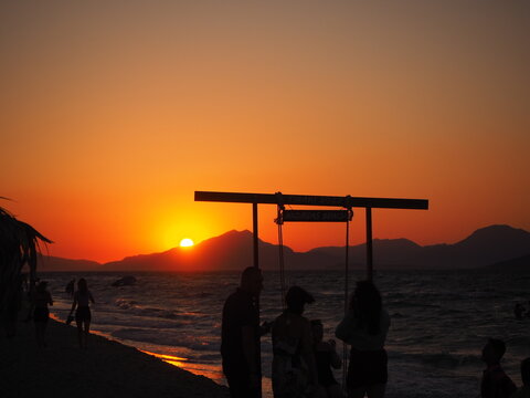 Sonnenuntergang am Strand im Urlaub