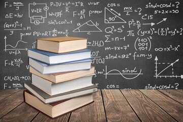 Math geometry formulas on board background and books.