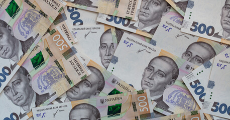 100 dollar and  500 hryvnyas banknotes background