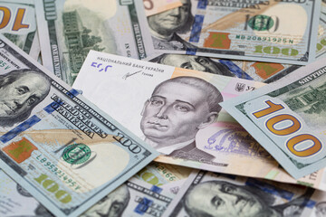 100 dollar and  500 hryvnyas banknotes background
