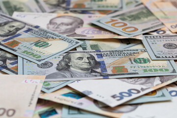 100 dollar and  500 hryvnyas banknotes background