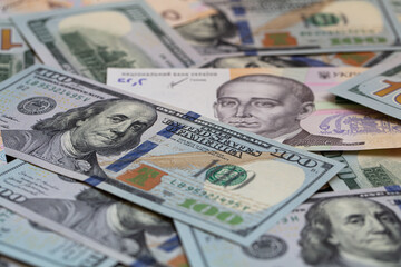 100 dollar and  500 hryvnyas banknotes background