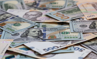 100 dollar and  500 hryvnyas banknotes background