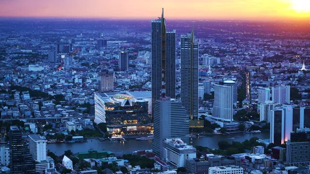 Panoramic blue hour view of Bangkok's cityscape. Iconsiam by the river