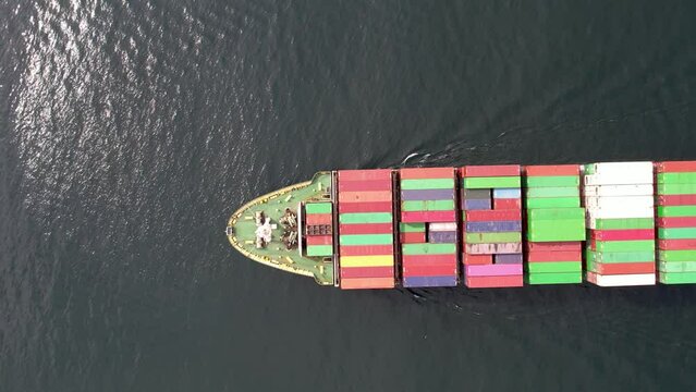 Large container ship at sea. Top down view. Cargo container ship vessel import export container sailing.
