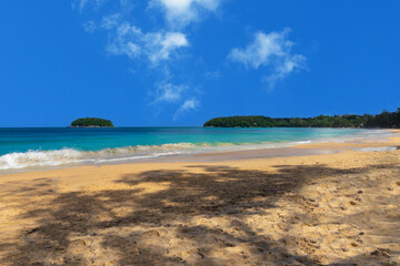 Colourful Skies Sunset over Kata Beach in Phuket Thailand. This Lovely island waters are turquoise blue waters, lush green mountains colourful skies and beautiful views of Pa Tong Patong