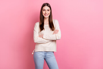 Portrait of attractive cheerful content brunet girl folded arms isolated over pink pastel color background