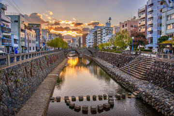 Fototapeta na wymiar Nagasaki, Japan Cityscape and Traditional Bridge