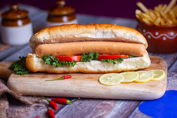 Hot Dog With Yellow Mustard, Onion, Pickles .copy space.
