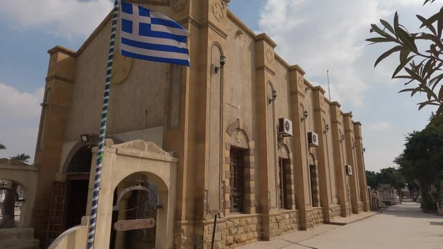 Greek flag outside The Greek Orthodox Church of St. George, Coptic Cairo, Egypt.
