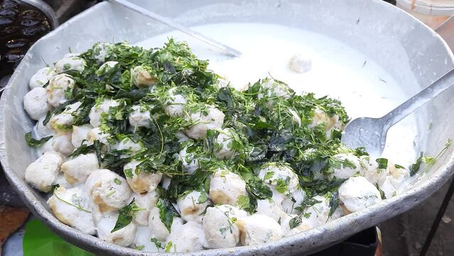 a Closeup Shot Of Super Soft juicy Dahi Vada. Indian Tasty Street Food Dahi Vada