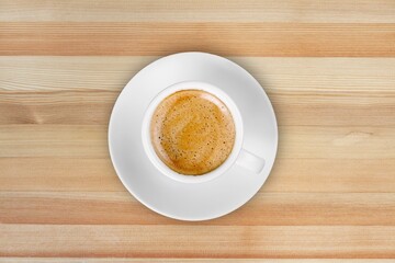 Tasty aroma coffee on desk background.