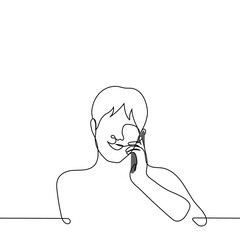 man smiling while talking on the phone - one line drawing vector. concept of lover speaks with lover, pleasant telephone conversation