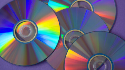 background of some colorful compact discs