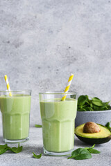 Green vegan smoothie. Smoothie with apple, banana and avocado. Detox menu