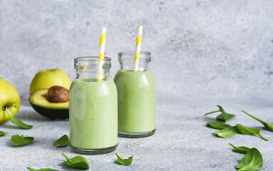 Green vegan smoothie. Smoothie with apple, banana and avocado. Detox menu