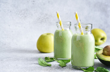Green vegan smoothie. Smoothie with apple, banana and avocado. Detox menu