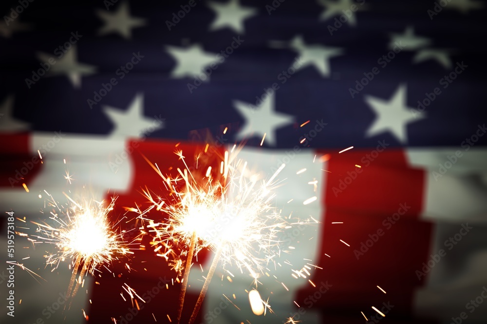 Wall mural Happy 4th of July Independence Day, Sparkler fireworks USA celebration with American flag nature background. Concept of Fourth of July,Independence,Fireworks,Sparkler, Memorial,Veterans