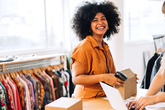 Happy online store owner smiling at the camera