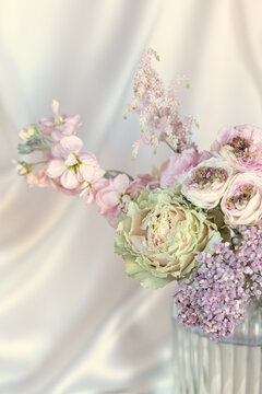 Beautiful bouquet of spring flowers in a vase on the table. Lovely bunch of flowers .Soft focus.