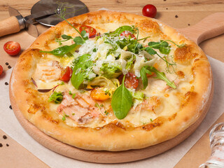 pizza with chicken fillet vegetables and parmesan