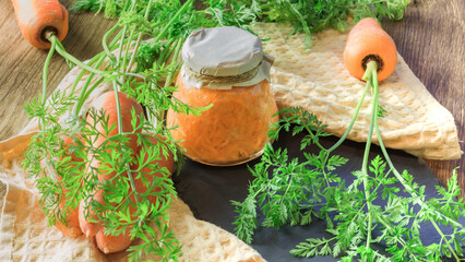 Canned carrots in a jar. Homemade pickled vegetables. Healthy vegetarian food concept