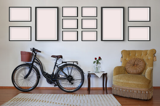 12 empty picture frames on the room wall for mockup. All picture frames have 3:2 aspect ratio.