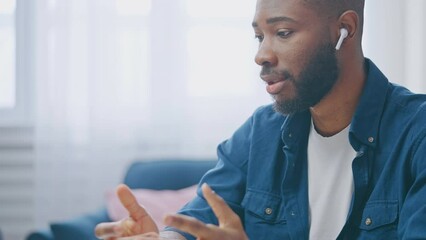 Smart african american man having online call, working from home, education